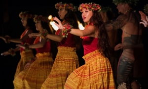 Luau dancers by torchlight at night