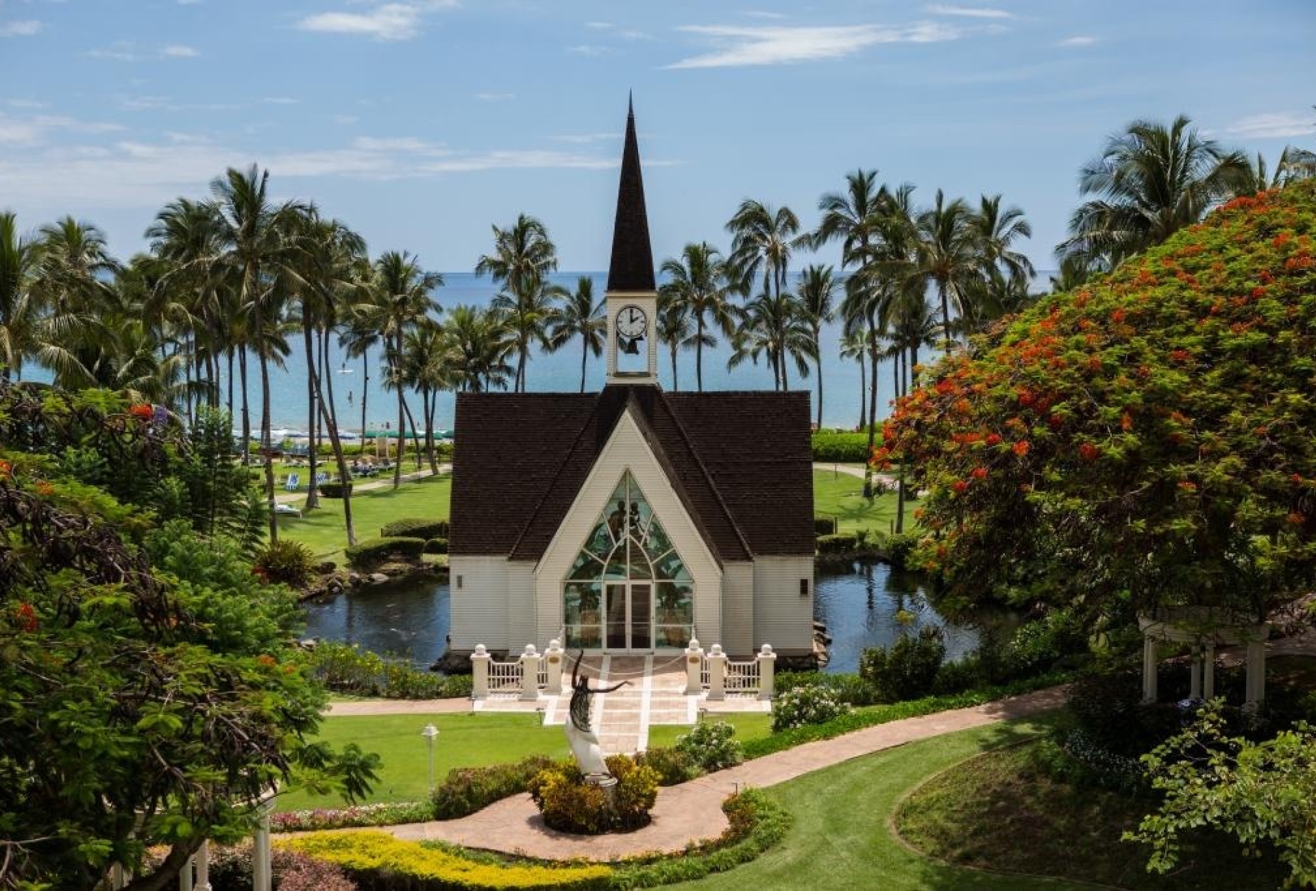 A chapel nested in a green garden